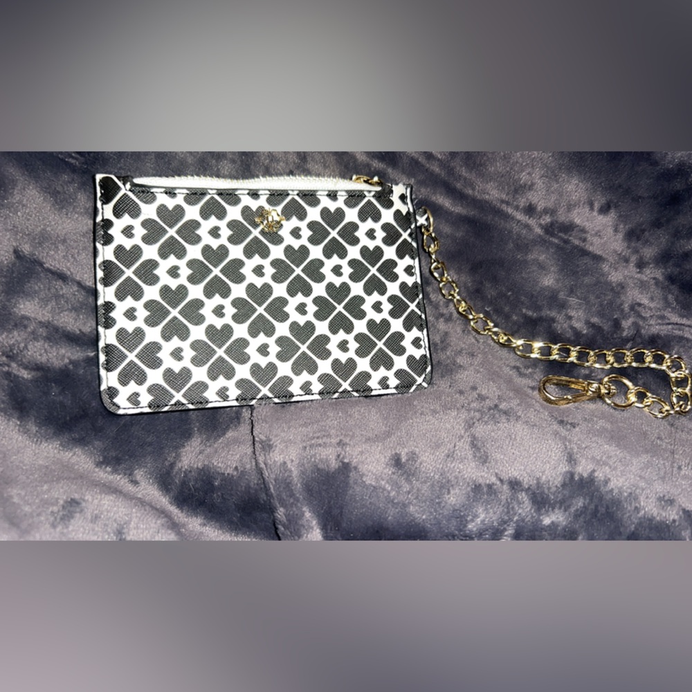 Nanette Lepore skinny hearts wallet or card holder. It features a black & white